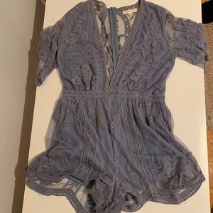 Honey Punch light blue plunging neck romper